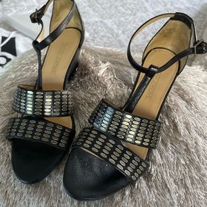 Black and brushed nickel dress shoes